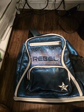 Rebel Sparkling Teal Backpack with Rhinestone Logo